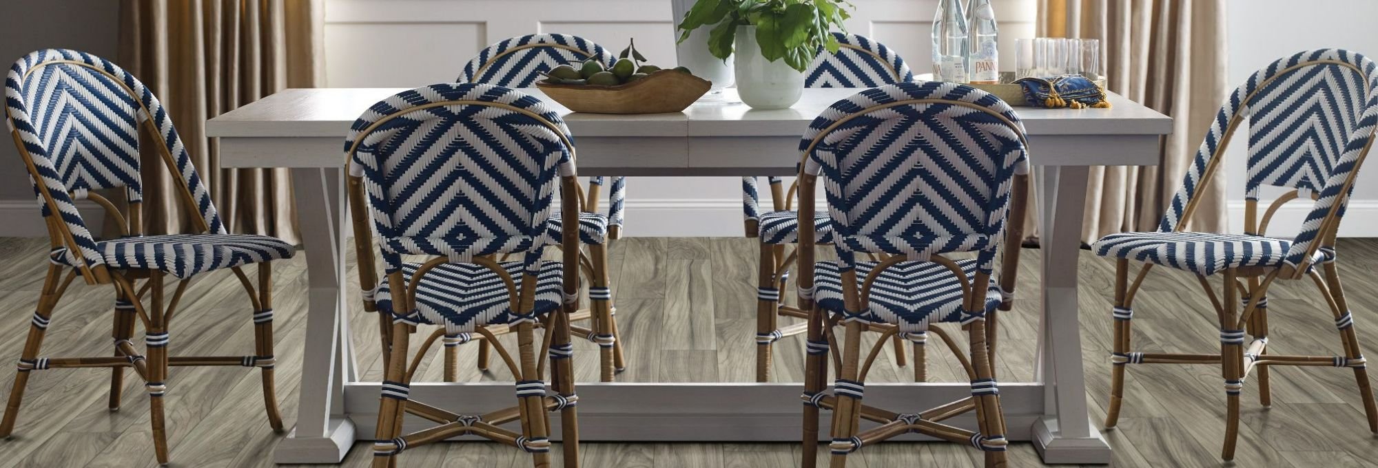 Table with chairs on laminate flooring from McCabe's Quality Flooring in Marquette, MI