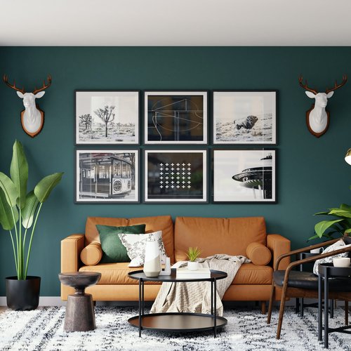 colorful living room with green wall and brown and dark grey furniture